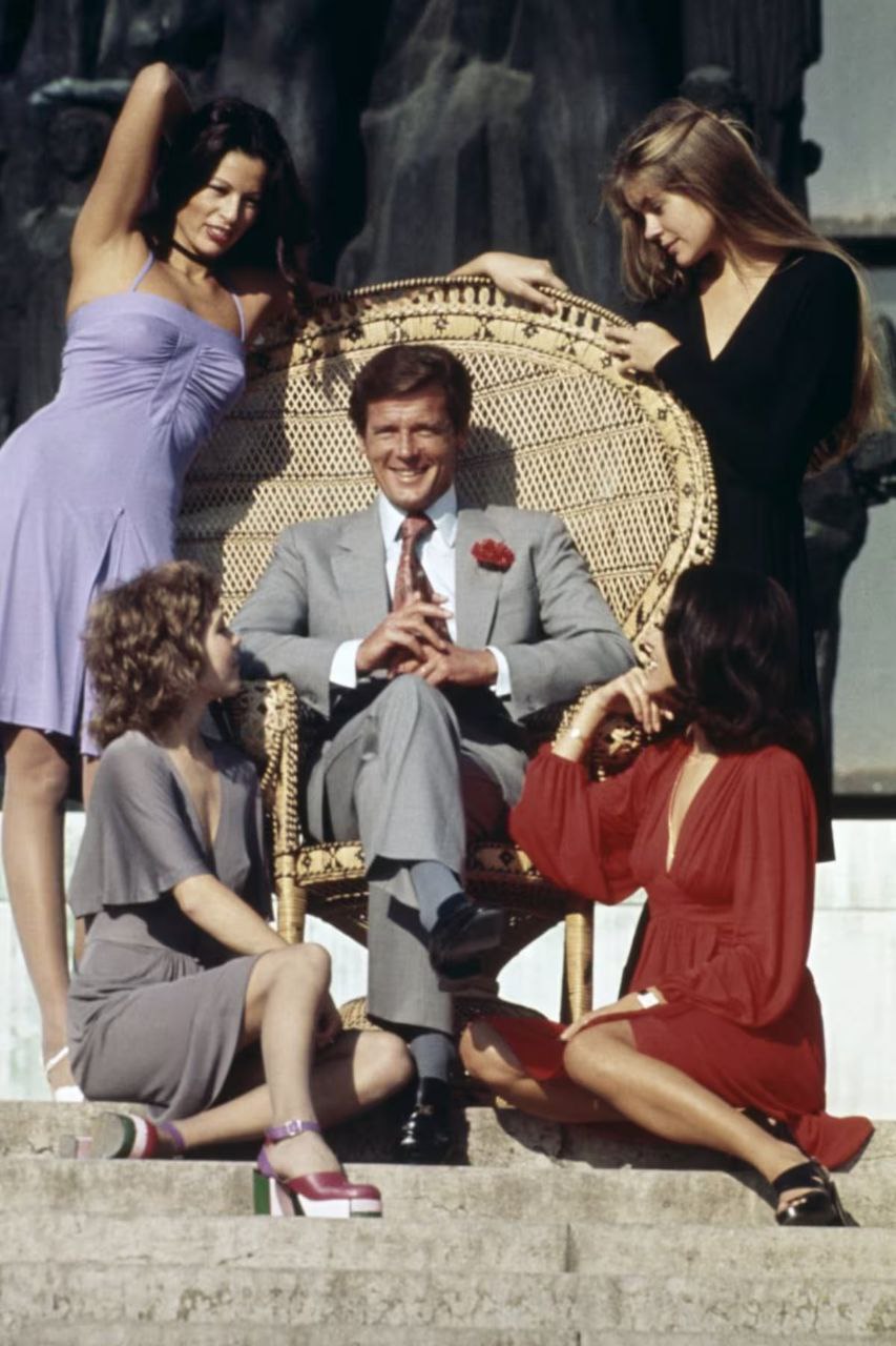 a group of people sitting on a bench